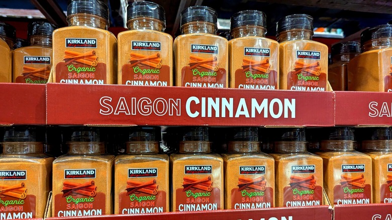 Shelf full of jars of Kirkland Signature Cinnamon