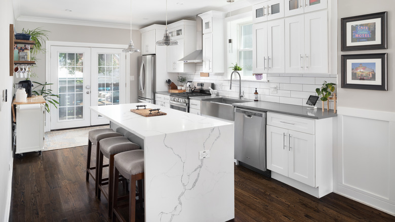 Modern kitchen with waterfall countertop island