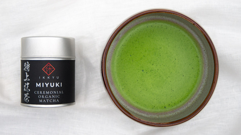 matcha in bowl and matcha container