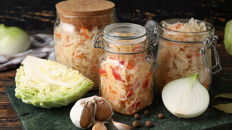 Three jars of homemade sauerkraut
