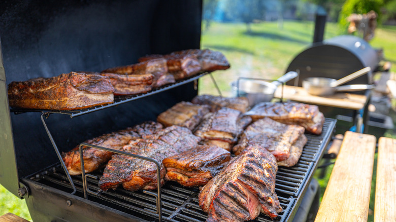 Meat smoking on a BBQ smoker