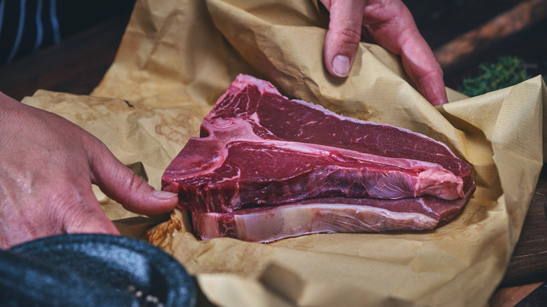 A steak wrapped in butcher paper