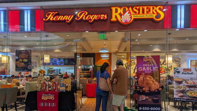 Shopper consider dining at a Kenny Rogers Roasters