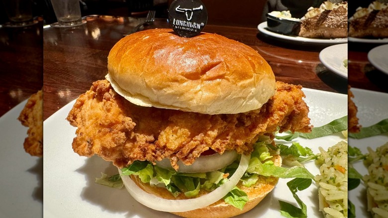 Crispy chicken sandwich with rice at Longhorn Steakhouse