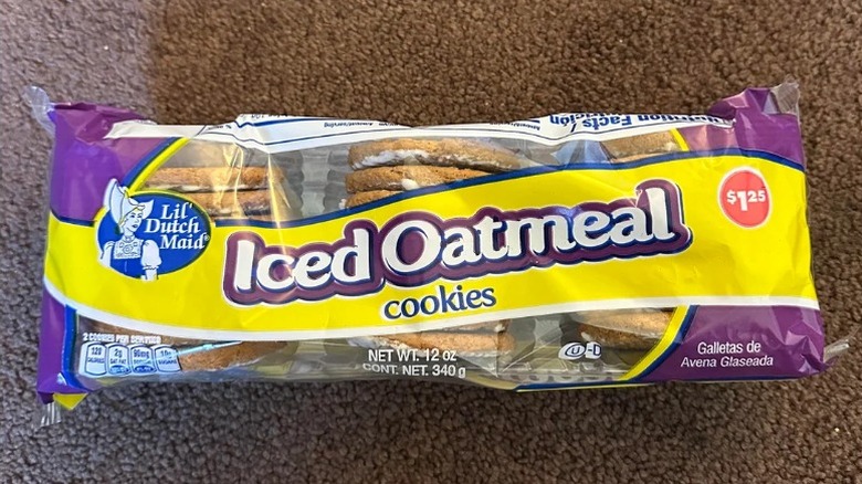 A package of Lil' Dutch Maid Iced Oatmeal Cookies against a brown background