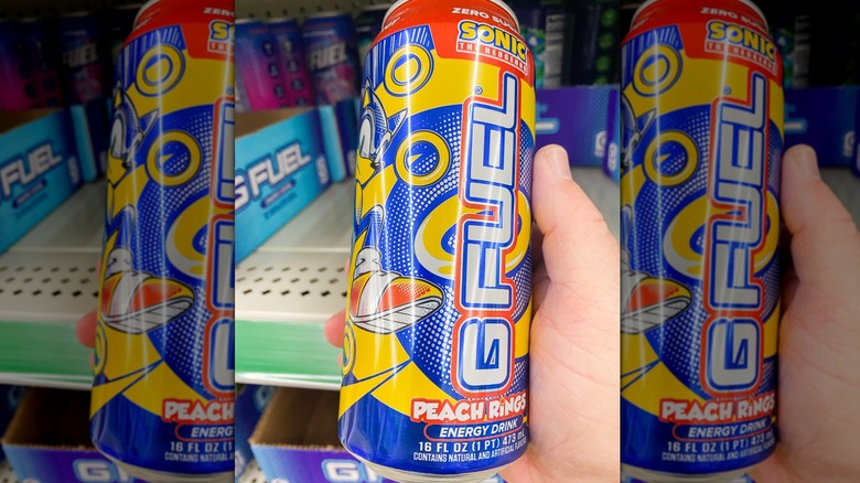 Person holding can of GFuel Sonic Peach Rings