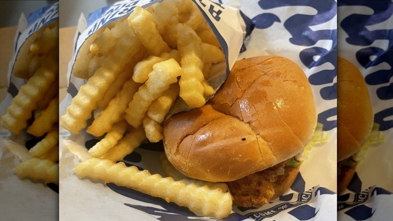 A chicken sandwich and fries from Culver's sits in a wrapper.