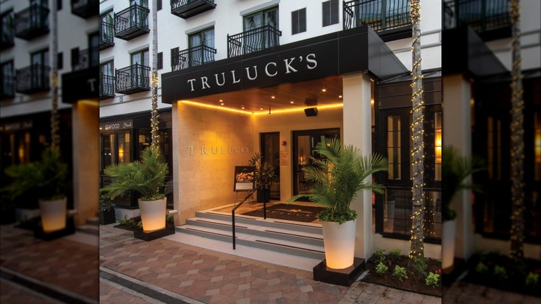 A sign advertises Truluck's restaurant