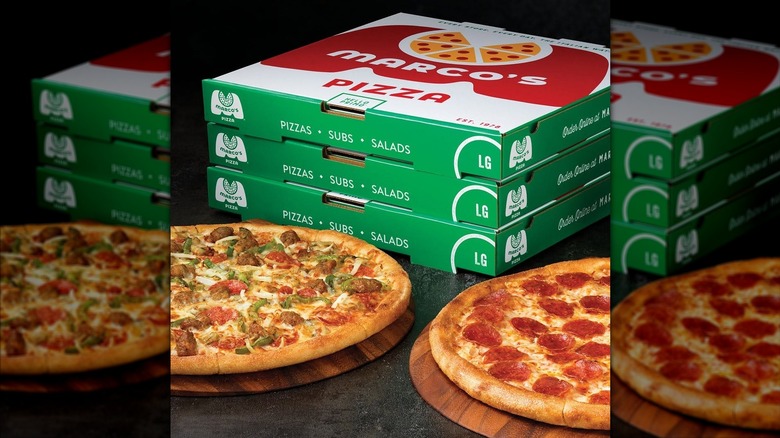 A selection of pizzas and pizza boxes from Marco's.