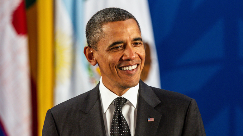 President Obama smiling at a press conference