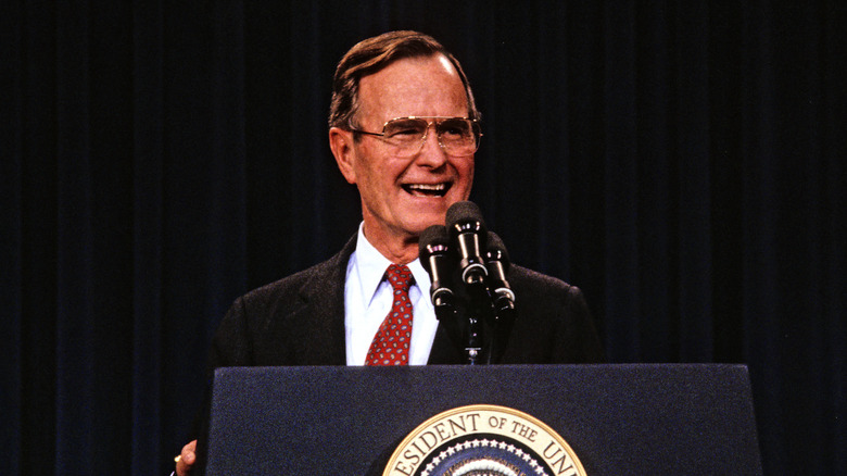 President Bush smiling during a press conference