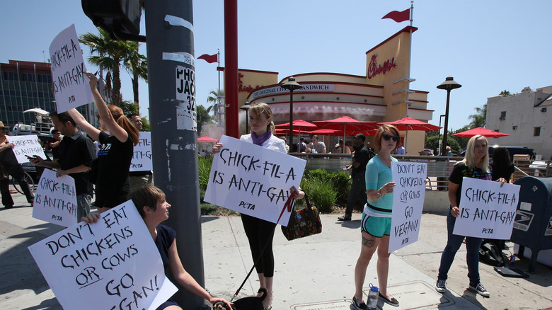 LGBTQ allies protest outside a Chick-fil-A