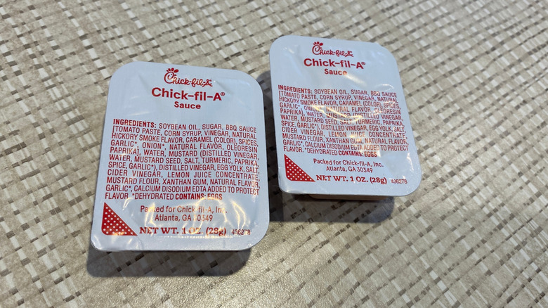 Two packets of Chick-fil-A sauce set together