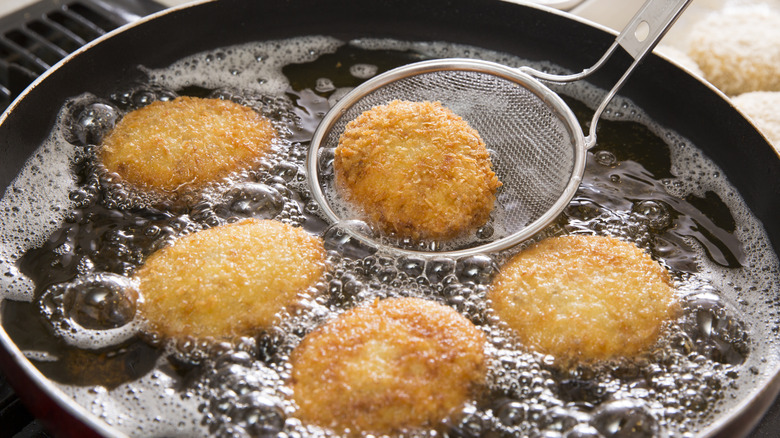 Home-frying food in a pan