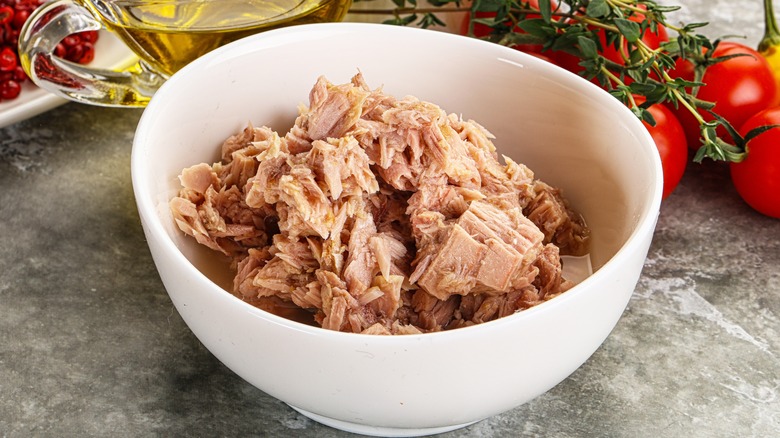 White bowl full of canned tuna