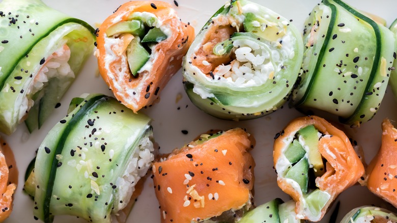 Various pieces of sushi sprinkled with everything bagel seasoning