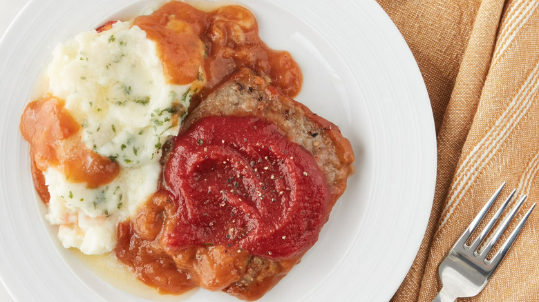 Walmart's Great Value Meatloaf and Mashed Potatoes meal plated on a white dish.