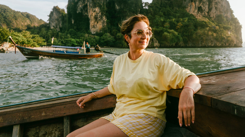 Woman sitting in a boat.