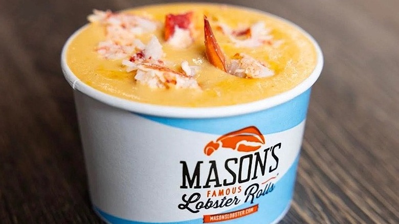 A branded paper bowl of Mason's Famous Lobster Rolls lobster bisque