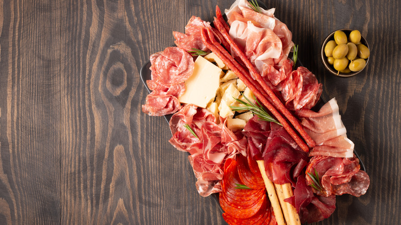 Deli meats in a charcuterie board