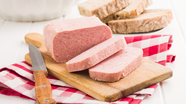 Luncheon meat on a cutting board
