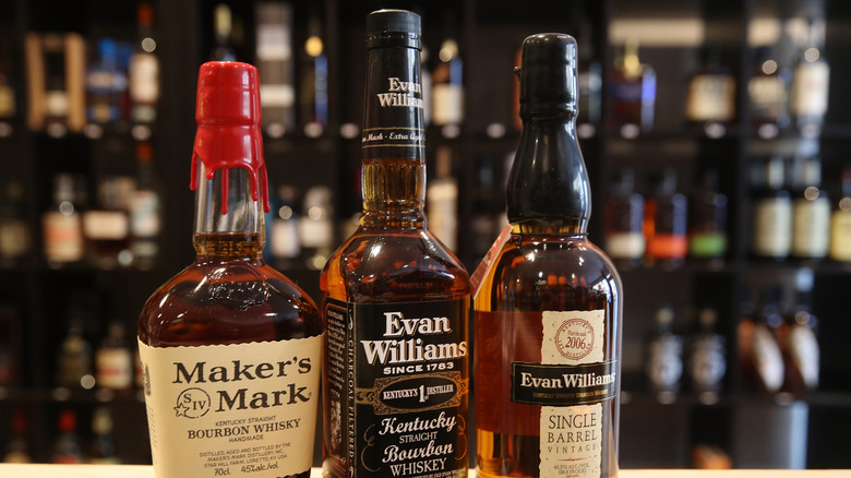 Bottles of bourbon arranged at a whiskey shop