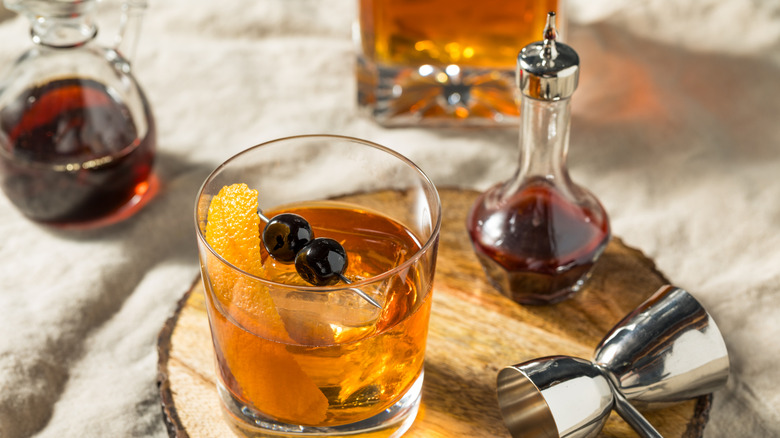 Old Fashioned cocktail with bourbon and cherries