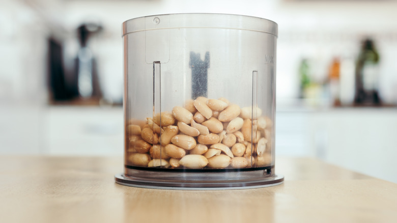 Peeled peanuts inside the blender