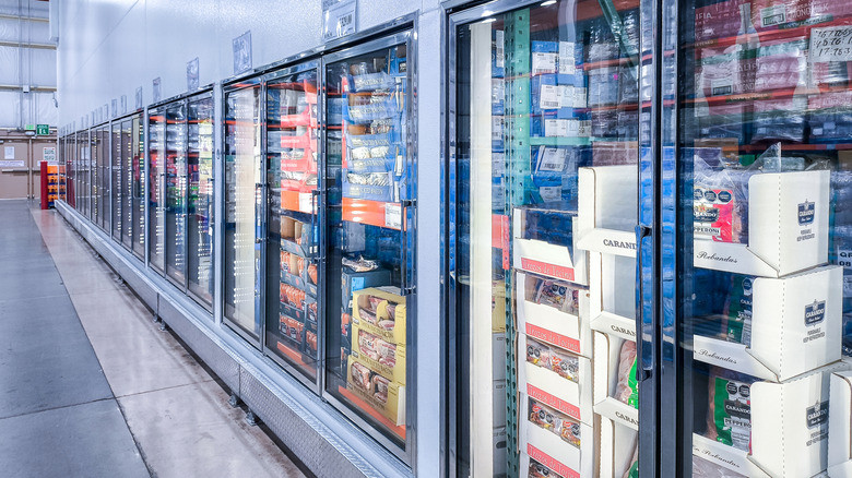 A Costco freezer displays many products