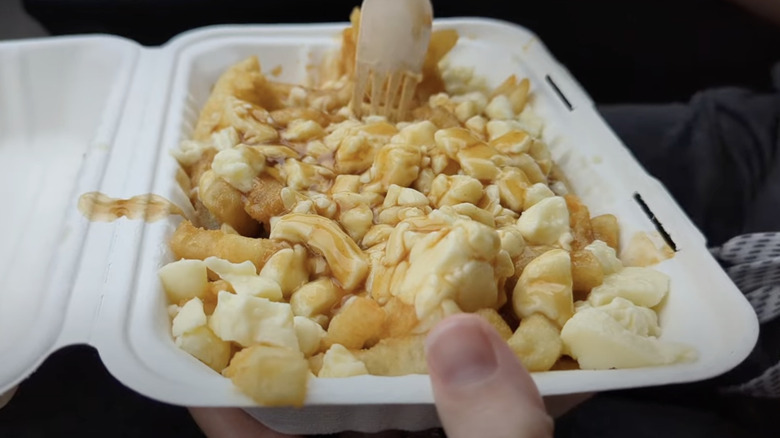A takeout container of Canadian Costco poutine