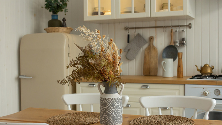 a wall of white shiplap in a country kitchen