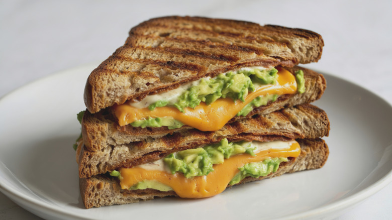 Grilled cheese and smashed avocado sandwich.