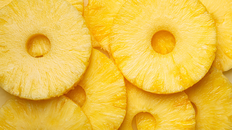 Overlapping pineapple ring slices.