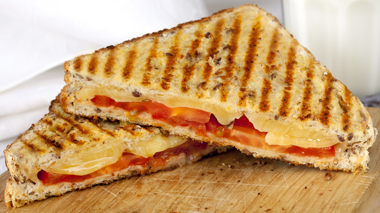 Grilled cheese sandwich with tomatoes.
