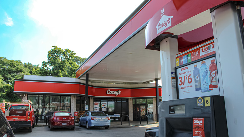 The outside of a Casey's with the gas pump foregrounded