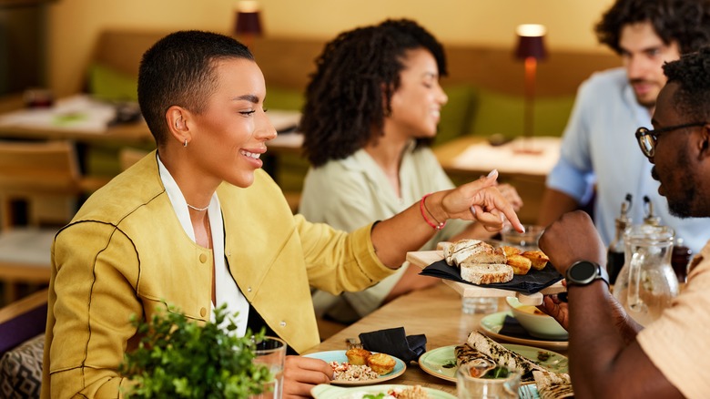 Four guests at dinner table