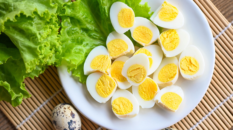 platter of halved hard-boiled eggs on lettuce leaves