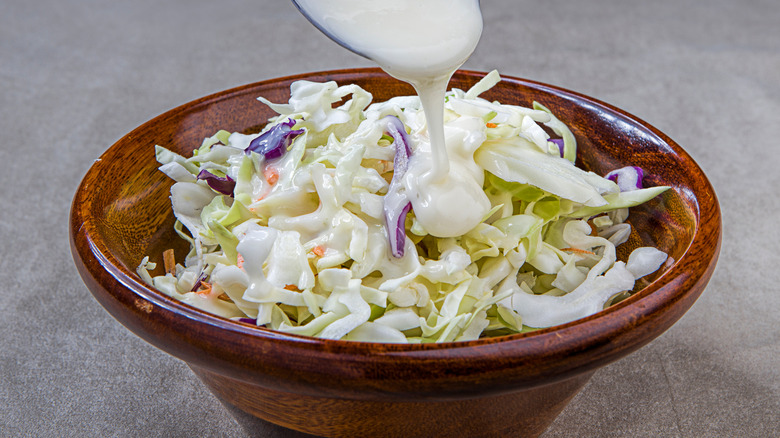 preparing coleslaw in bowl