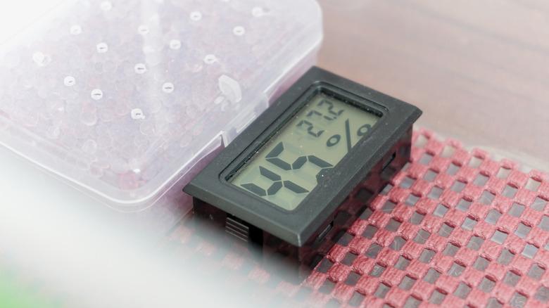 A hygrometer measuring a refrigerator's humidity levels