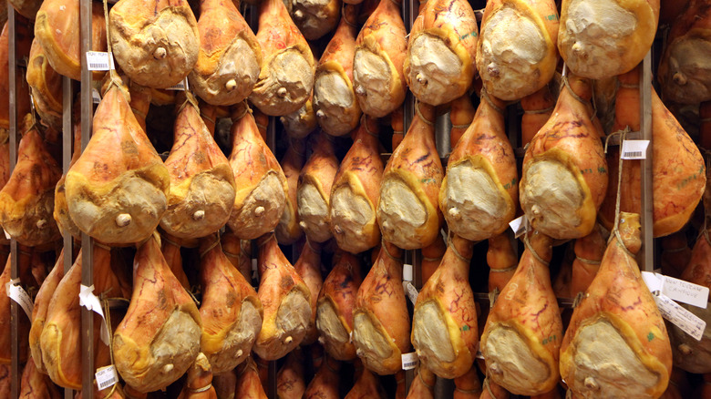 Legs of prosciutto dry-aging
