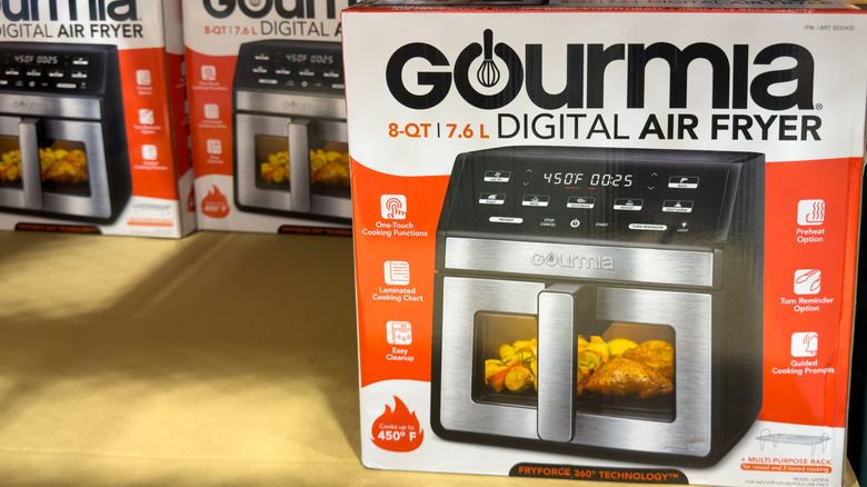 Gourmia 8-Qt Digital Air Fryer packaging on shelf with other boxes