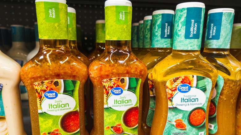 Bottles of Italian dressing on a supermarket shelf