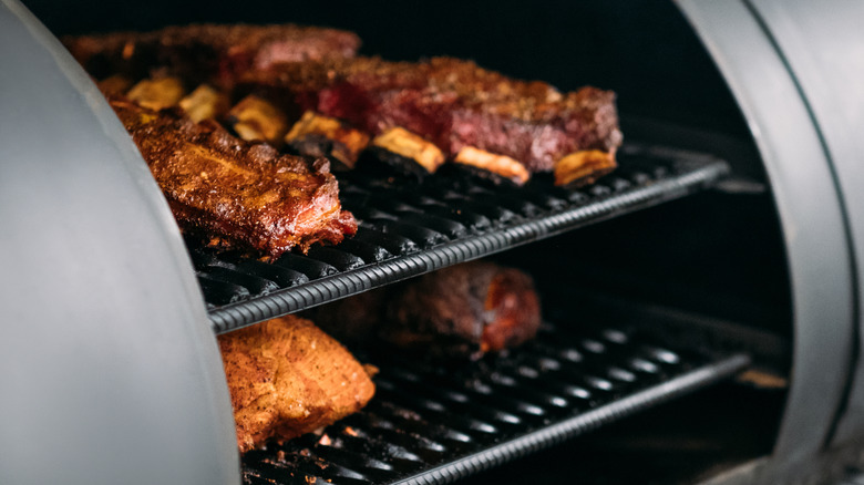meat in a smoker