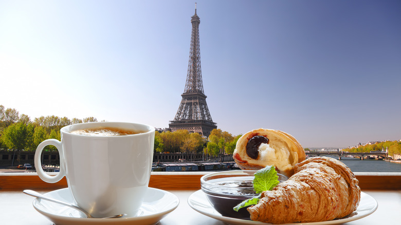 Coffee and croissant in front of Eiffel Tower