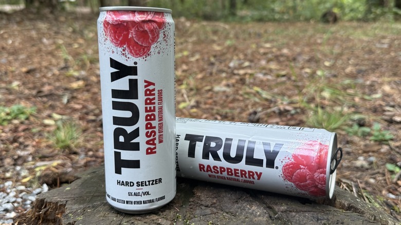 Two cans of raspberry Truly seltzer