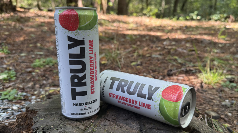Two cans of strawberry lime Truly seltzer