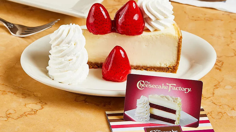 Slice of cheesecake and Cheesecake Rewards card