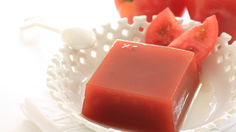 tomato aspic on plate with tomato slices