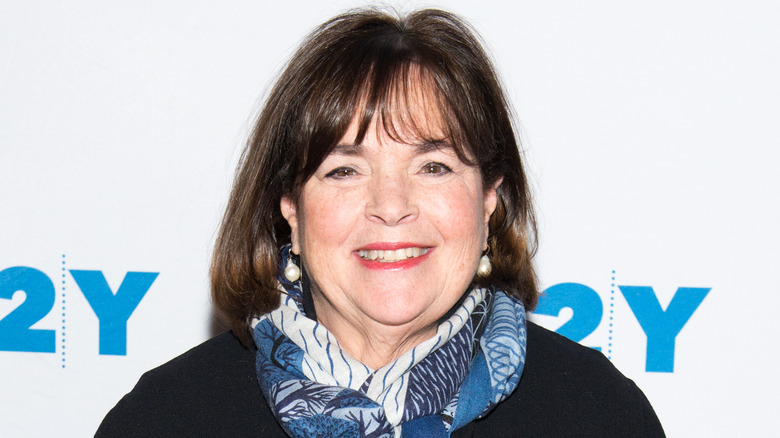 Ina Garten wearing scarf and pearl earrings