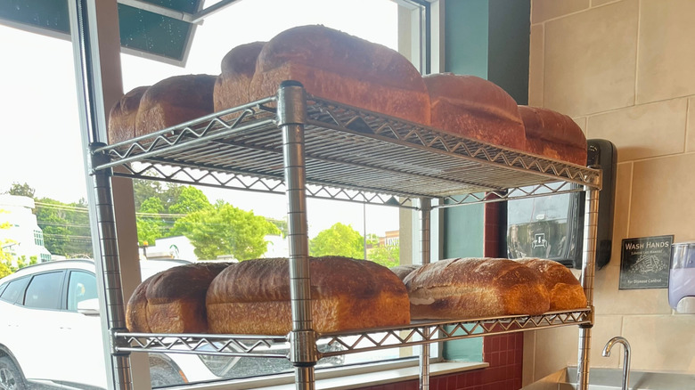 Loaves of bread on display on a baker cart